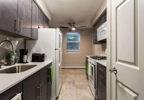 A kitchen at Crossings at Stanbridge apartments for rent in Lansdale, PA